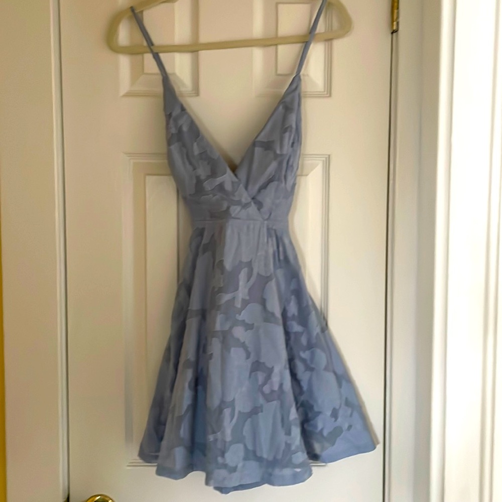 Pale blue cocktail dress with flower overlay